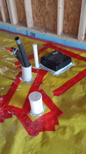 Right – All seams in the sub-slab vapor retarder were sealed with tape.
