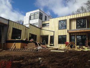 Right – Furring strips were installed to provide a 3/8-inch drainage plane over the rigid foam and under the fiber cement lap siding.