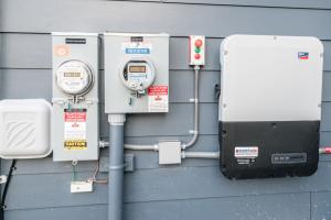 Right – The solar system production is tracked next to the home’s electrical meter.