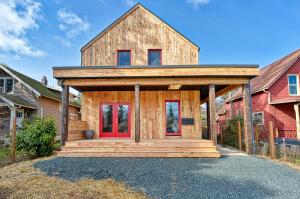 Right – This second-story deck also serves as a deep overhang to protect the entry door from weather