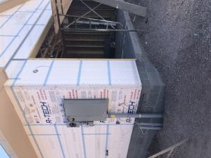 Right – all seams in the rigid foam were sealed with tape before installing the wire lathe for stucco. 