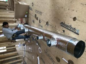 Right – A contractor installs mastic in branch duct take offs to air seal the seams where they attach to the trunk duct.