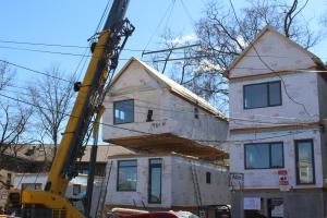 Right – The entire first floor and second floor of these modular homes were assembled in the factory and installed on an insulated concrete basement foundation on site. 
