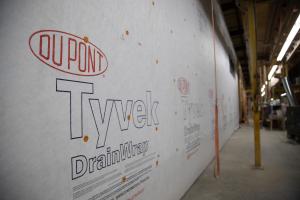Right – Even house wrap is installed in the factory for these modular homes where each floor is factory assembled. 