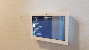 Right – Smart equipment for homes may include a tablet or touchpad from which the homeowner can control lighting, HVAC, window shades, security, music, and other home automation features.