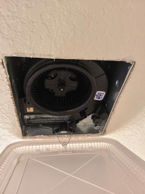 This fan was inserted into a cleanly cut hole in the ceiling so there is only a very narrow gap around the edges of the fan box that needs to be caulked or taped