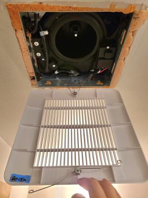 After air-sealing the exhaust fan box, re-install the fan, and lights if needed, and re-attach the cover