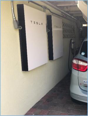 These two battery storage modules are charged by a 6 kW solar PV system during daytime hours and provide 27 kWh of whole house backup electricity storage