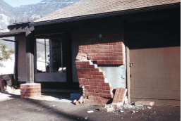 The brick veneer lacked adequate ties to keep the brick from peeling off the wall in an earthquake. 