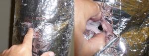 Wrong – A tear in the outer jacket of this duct shows where an in-line airflow measurement was made; the inner duct was not sealed and created a duct leak.