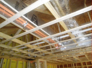 CPVC fire sprinkler piping insulated using the box-in method.