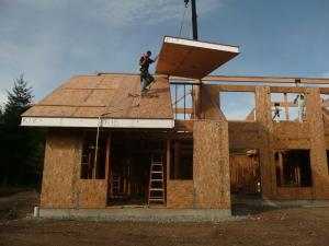 Clifton View Homes employs a SIP precision construction system consisting of structural insulated panels that come to the site precut for quick assembly, providing a continuous thermal blanket around the home. 