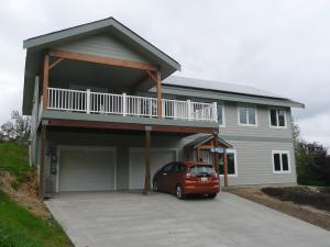 Clifton View Homes built this custom home in the marine climate in Coupeville, WA, and certified it to DOE Zero Energy Ready Home specifications in 2014. 