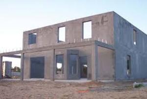 This high-thermal-mass home uses concrete construction for disaster resistance as well as to naturally regulate temperatures inside the house 