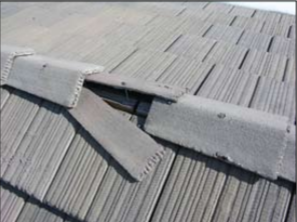 Wrong - Displaced concrete tiles can allow ember entry.