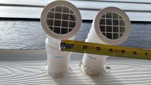 Wrong - Condensing furnace intake and exhaust are too close together.