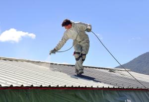 Right – This metal roof is being coated with a cool (high SRI) coating to reduce solar heat gain