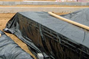 Cover lumber stored outdoors