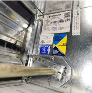 All dampers should be completely open in a duct system being tested for air leakage; this damper is only partially open and should be opened fully prior to testing