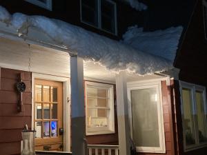 Snow and ice buildup over doorways can be a source of injury for occupants.