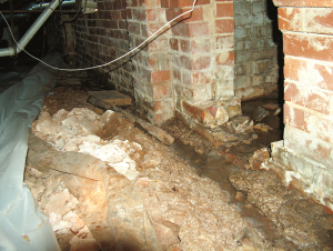 Wrong - A typical vented crawlspace in North Carolina exhibits water leakage, poor drainage, and a low-quality vapor retarder that does not cover all of the ground surface and is not sealed to the walls. 