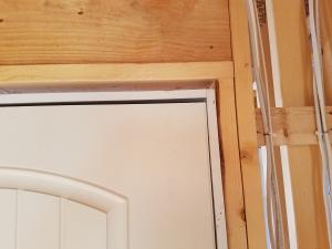 Wrong - Door frame improperly sized for pre-hung door jamb.