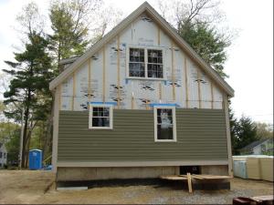 Drainage and back ventilation of wood cladding is provided by ¾ inch furring (1x4).