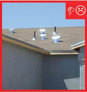 Ventilation inlet is too close to exhaust outlets and does not extend at least 2 ft. above the roof deck