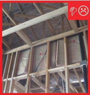 Wrong – No rigid backing was installed on the attic knee wall.