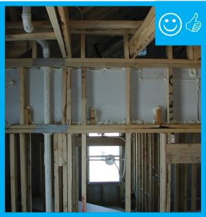 Right – The backing on this knee wall was air sealed prior to insulation.