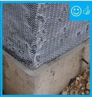 There is a weep screed installed at the bottom of the wall