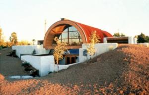 Example of an earth-sheltered home in hot climate Tempe, AZ uses the cooling properties of the ground to decrease cooling costs