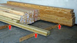 Elevate stored lumber