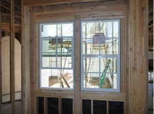 This wall and window assembly has excessive framing around the windows, which can lead to heat gain in how climate zones. 