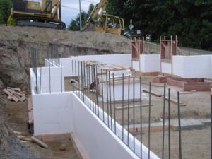 Insulated concrete forms (ICF) are hollow blocks made of sheets of rigid foam that are stacked like bricks then filled with poured concrete to create insulated concrete walls for homes and buildings