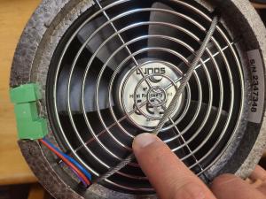 Right - Fan end view of a small through-the-wall HRV unit; 2 of 14.