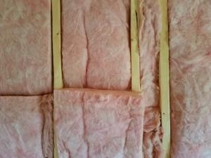 Wrong - Fiberglass insulation is poorly installed in wall cavities.