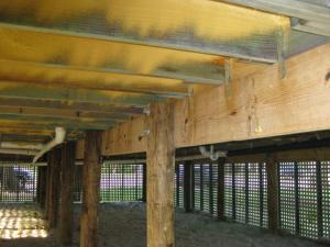 Pier foundations, hurricane strapping, borate- and pressure-treated lumber, and high-density spray foam insulation help protect this New Orleans home from costal flooding and storms (Source: Green Coast Enterprises).