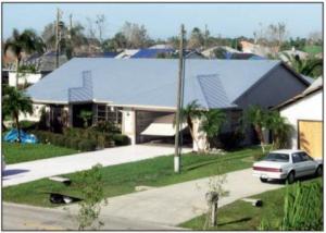 Wrong - Negative pressure from hurricane winds caused garage door to collapse inward.