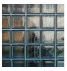 Glass blocks allow in daylight while maintaining privacy and also provide protection against high winds and floods.