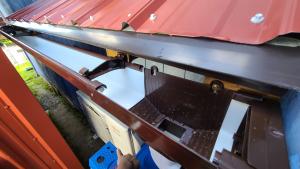 A gutter was installed onto this awning to manage rainwater.