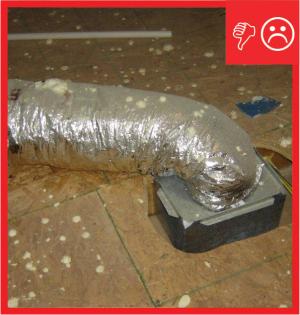 Wrong - Flex duct resting on floor compressing insulation and causing condensation 