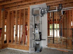 Drywall is installed both prior to and after HVAC equipment is installed to create an airtight closet away from garage pollutants.