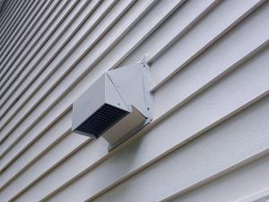 Right – The termination of this kitchen exhaust duct is sealed to the wall to keep out air and water and is screened to keep out pests.