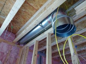 Wrong - If this kitchen exhaust duct had been extended a few inches, at least one bend could have been eliminated.