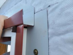 Right - Head flashing is good and carries water away from jamb.