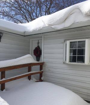 Heavy snow loads can exceed roof load limits risking roof collapse 