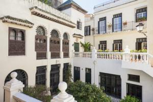 Light colors have been used on exterior walls and roofs to keep buildings cooler in hot climates for centuries, as shown by this traditional building in Morocco, built in the early 1800s