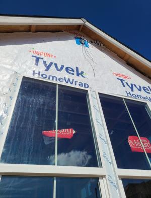 Right - The house wrap is properly flashed and taped, and all penetrations are properly flashed.