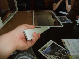 Exterior aluminum storm window showing weep channel, example 1